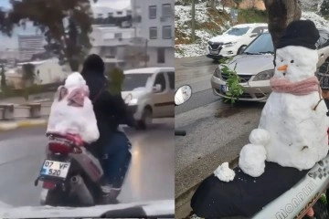 Antalya’da motosikletin arkasındaki kardan adam ile şehir turu attı